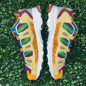 Adidas x Disney Yellow Mesh Athletic Sneaker with Blue and Green Accents